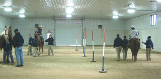 Therapeutic riding volunteeers at work