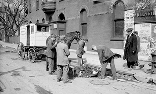 Prisoners from Bridewell Prison cleaning street