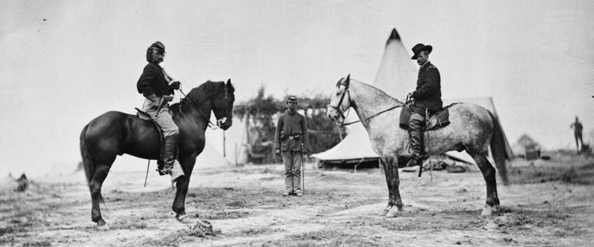 Capt. George A. Custer and Gen. Alfred Pleasonton on horseback at Falmouth, Virginia, April, 1863.