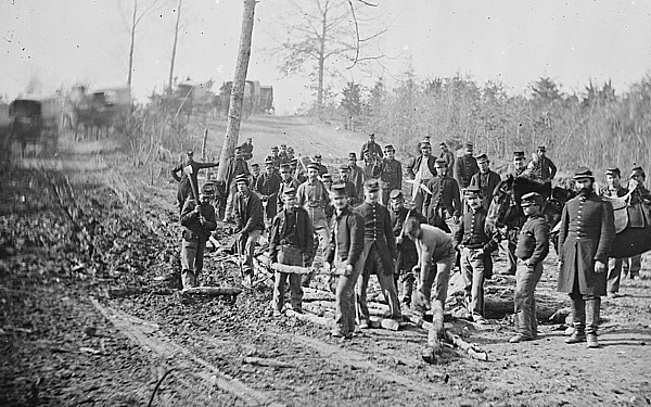 Civil War engineers building a corduroy road