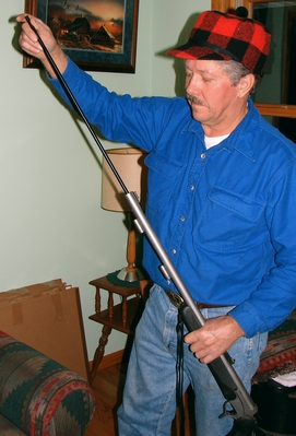 Using a ramrod to load a muzzleloading rifle