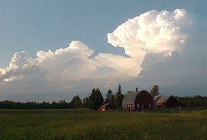 Sunset clouds over farm at Jacobson, Minnesota